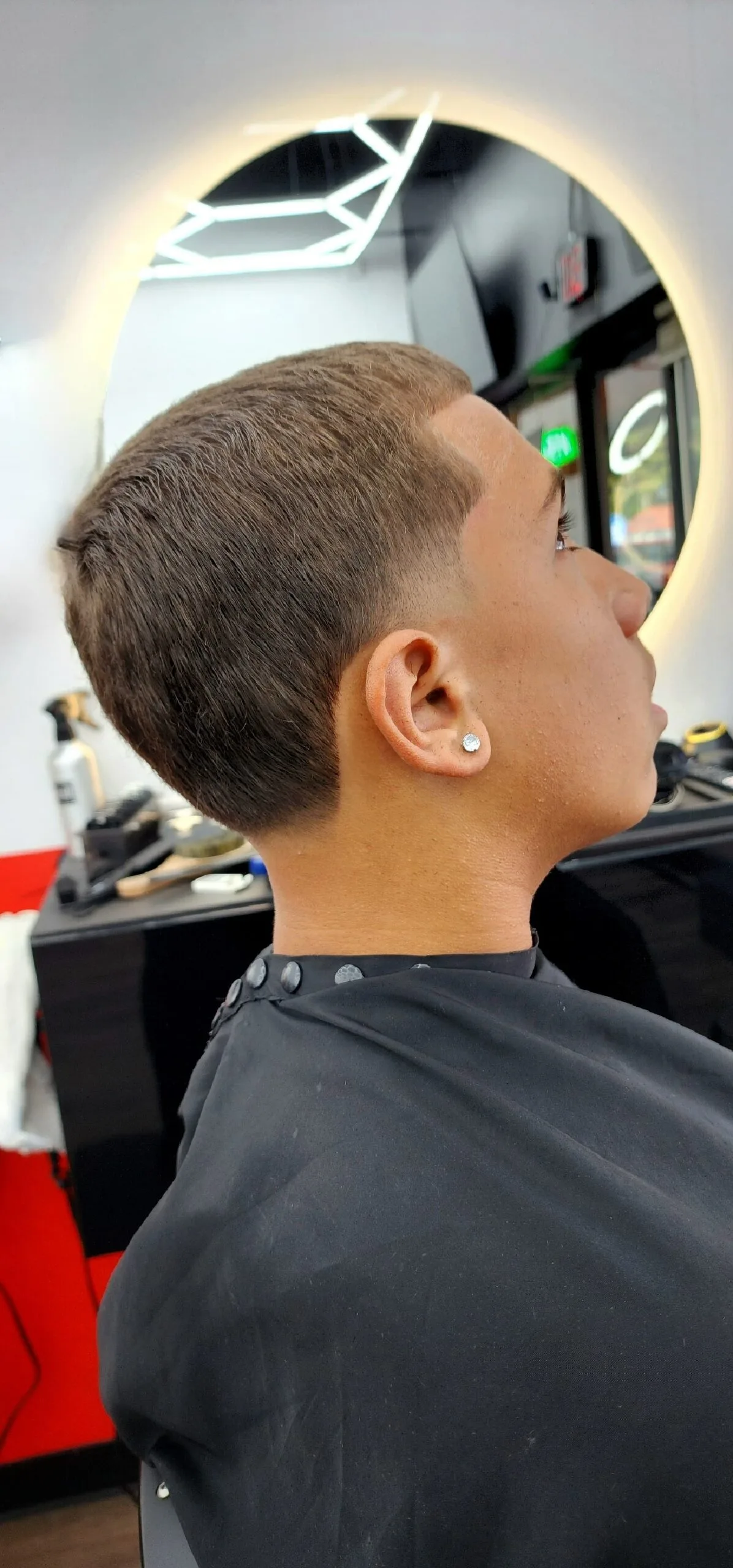 Haircut by Bro's Dominican Barbershop