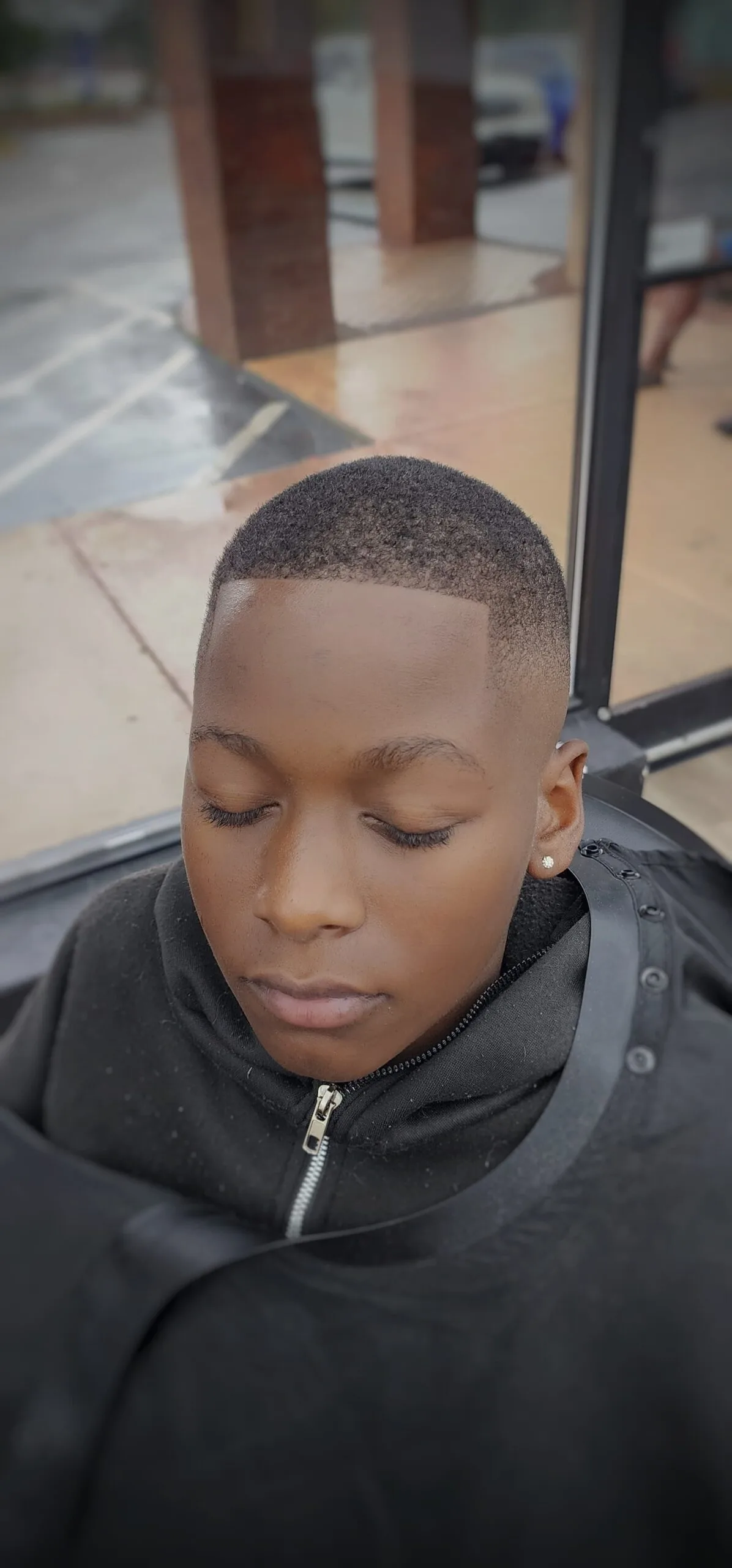 Haircut by Bro's Dominican Barbershop