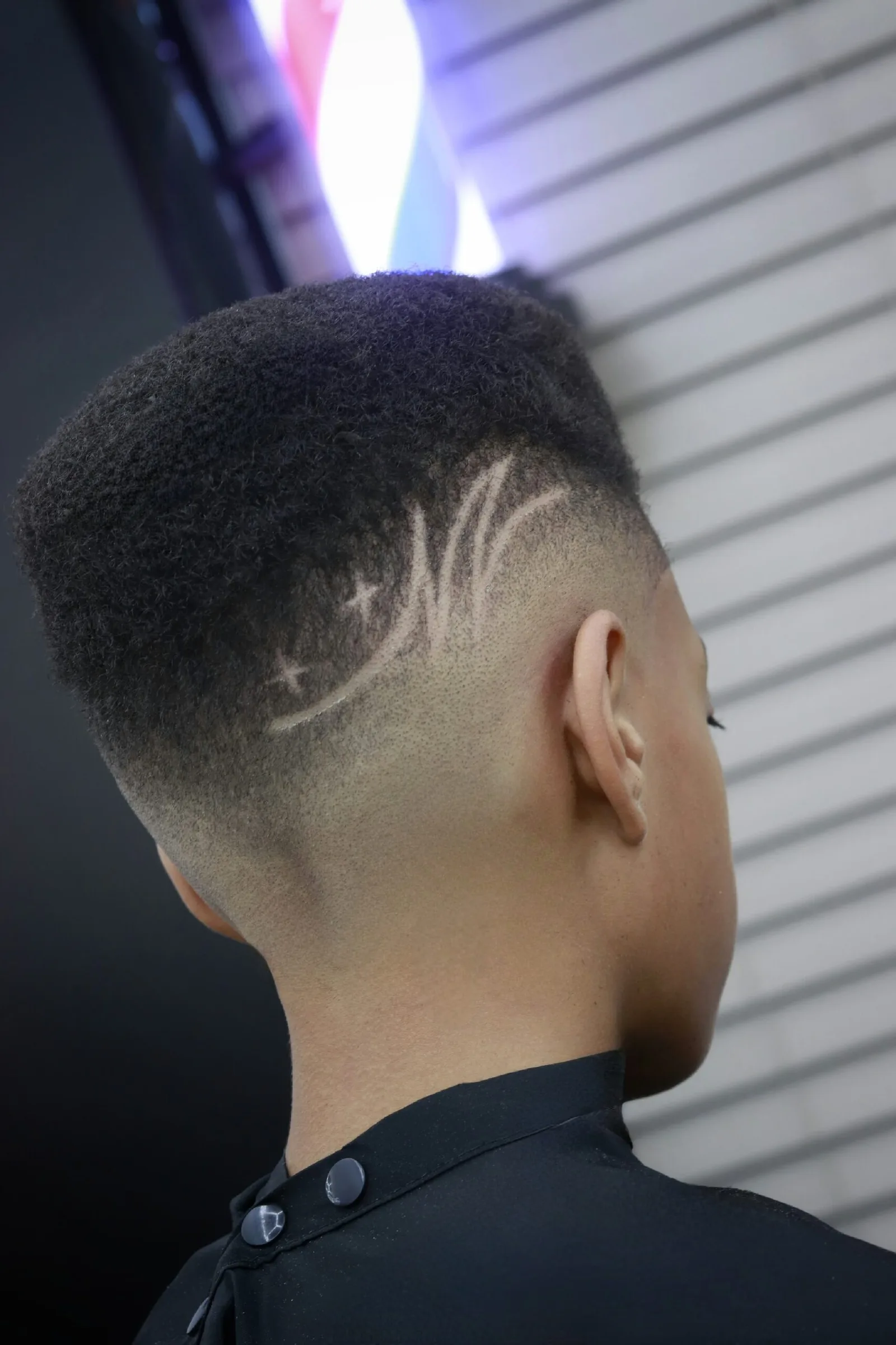 Haircut by Bro's Dominican Barbershop